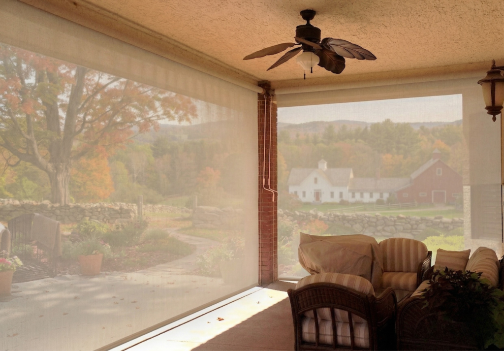 View of Pennsylvanian countryside through the mesh of a Sunroll retractable screen.