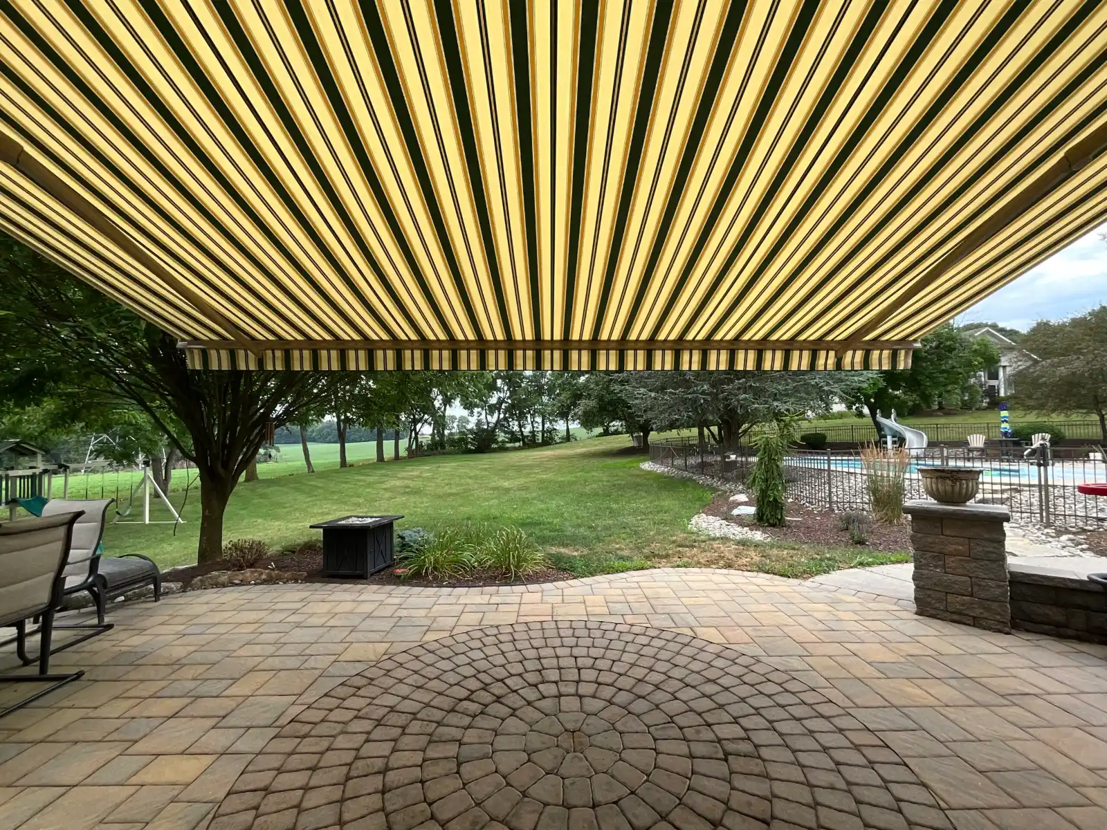 Retractable awning over patio